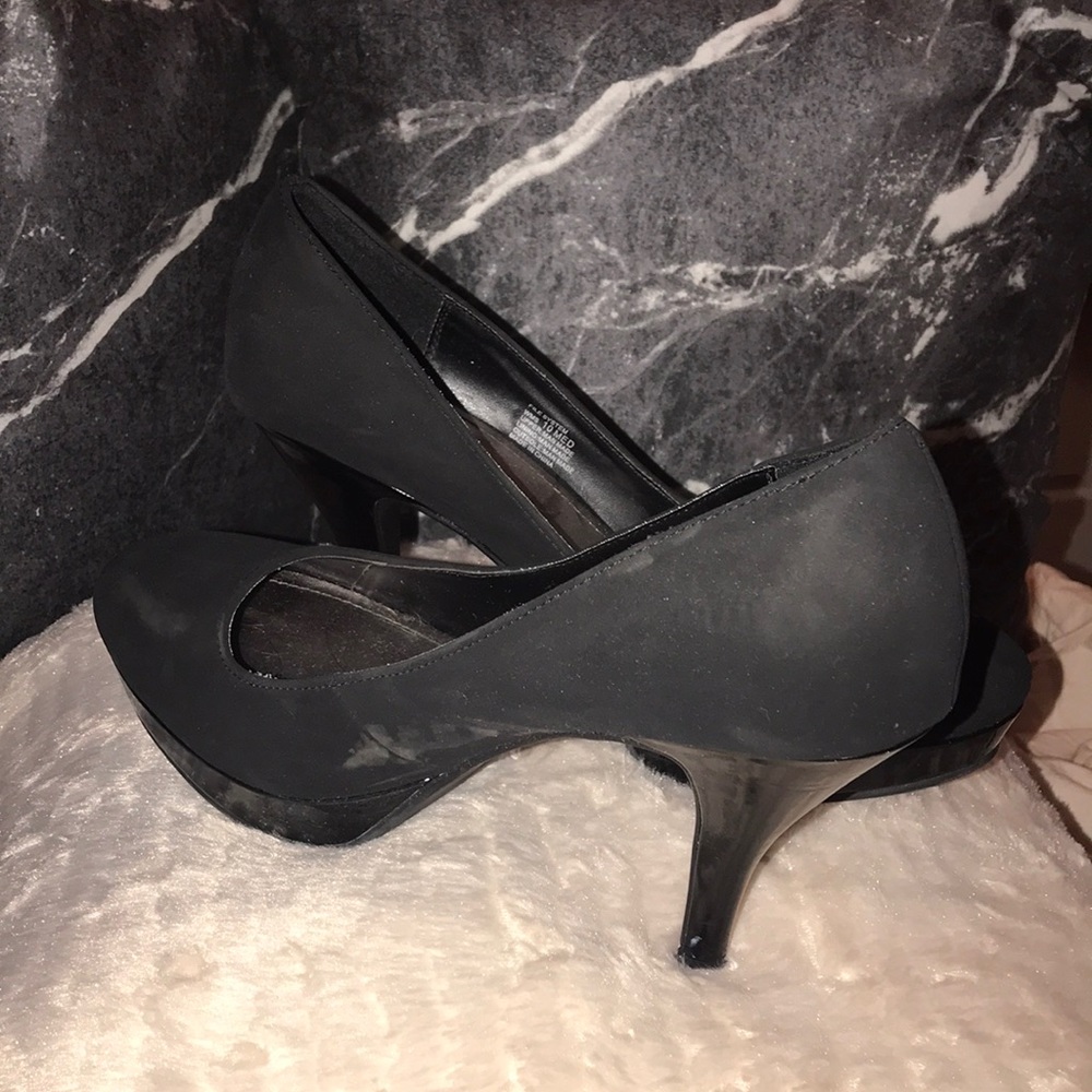 One pair of black stiletto heels